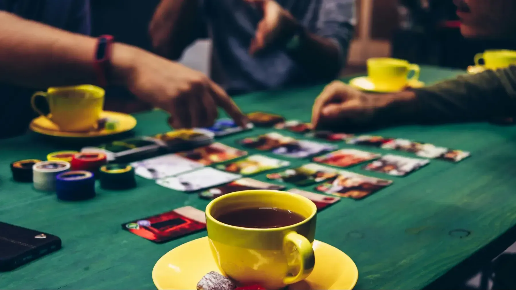 Playing Card Games and Drinking Tea