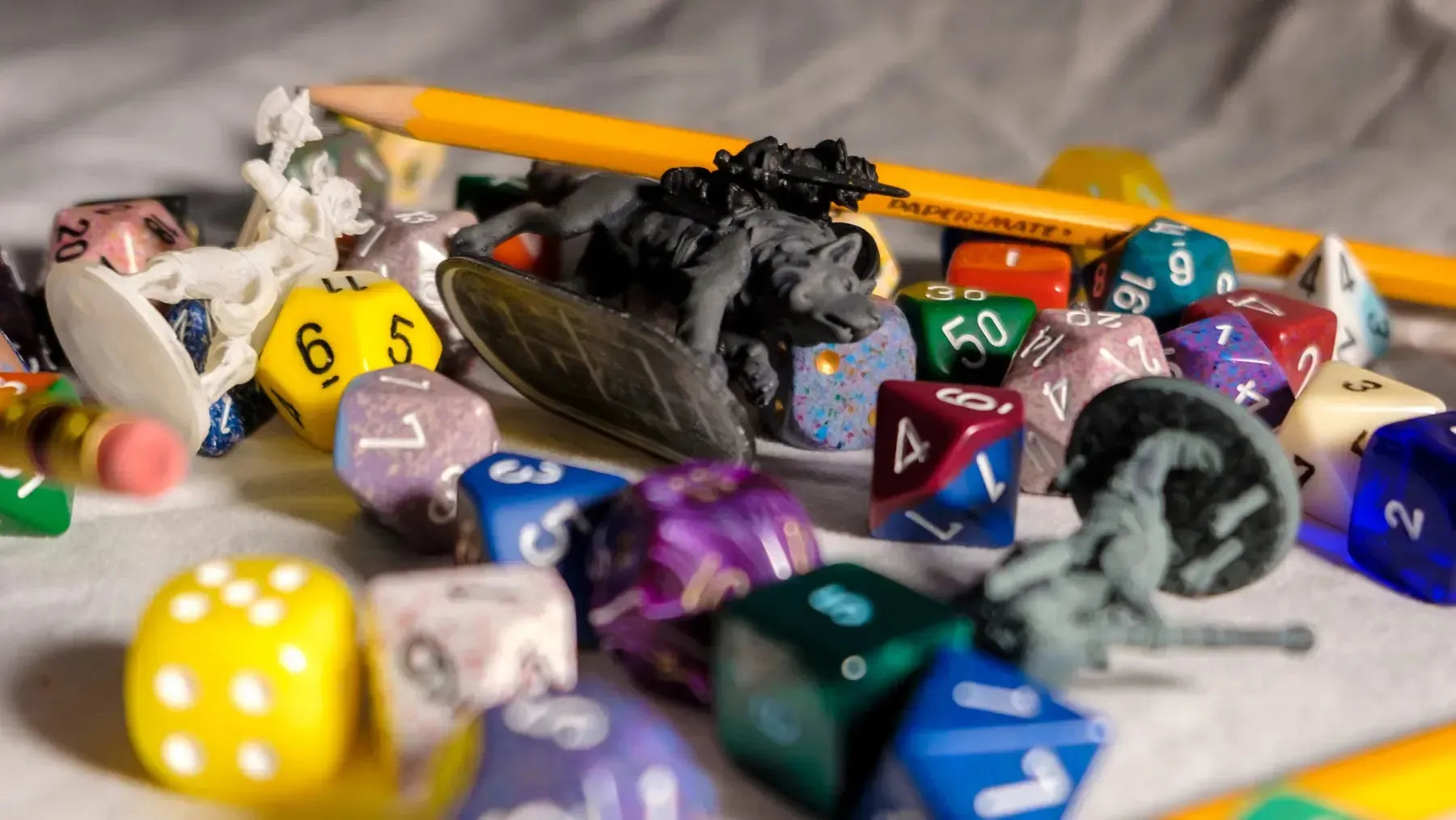 Different Dice and Board Game Figurines