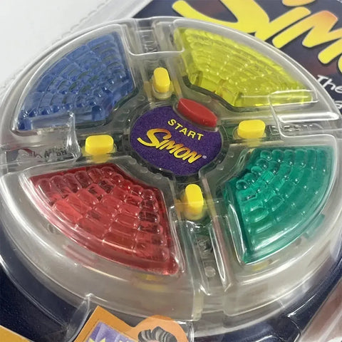 Simon - Puzzle Abstract Electronic Handheld Game for Adults, Family, and Children (1+ Players, Ages 7+) - Hasbro [Milton Bradley] - (1999)